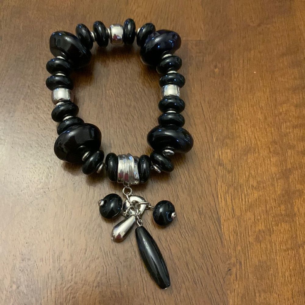 Black beaded bracelet with silver accents Stretch band